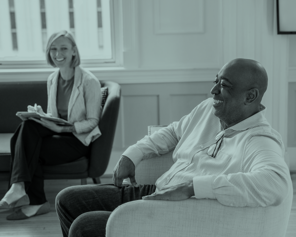 Business people conversing in a meeting