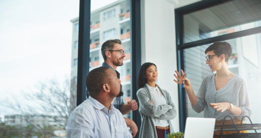 shot of a diverse group of colleagues having a discussion in a modern office