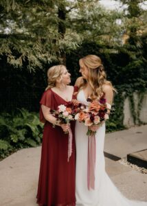 twin sisters Katie (left) smiling at Kaela (right)