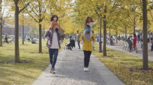 Children on the shoulders of their fathers