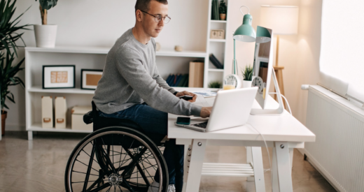 man on wheelchair taking digital learning course