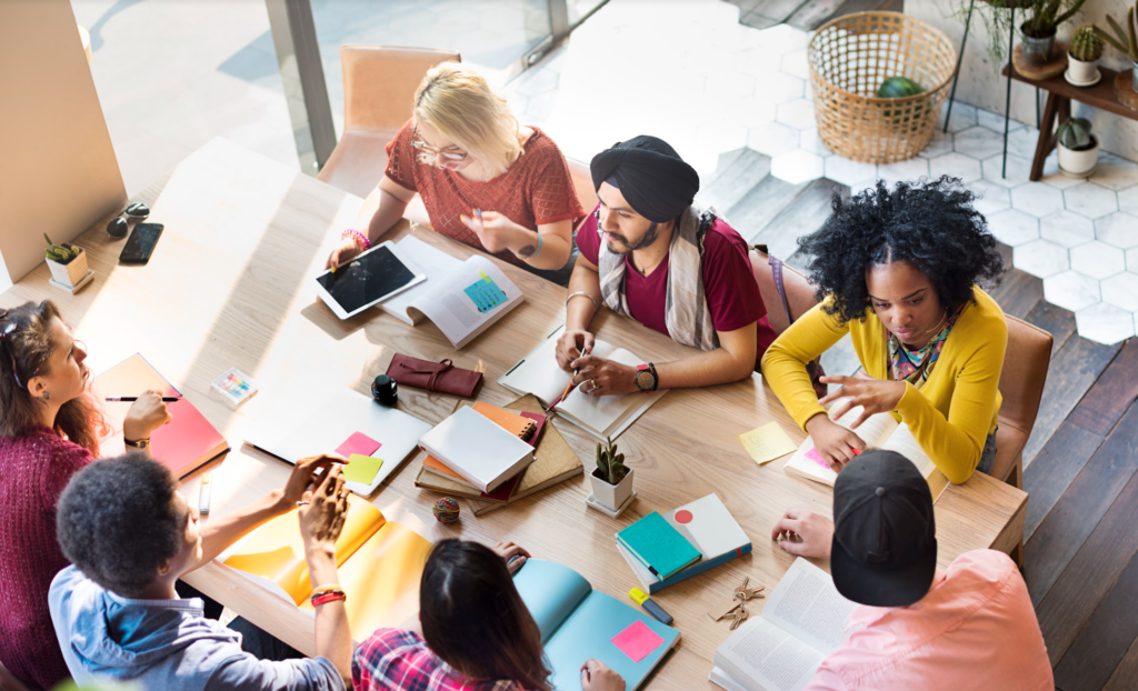 stock image of a diverse team working