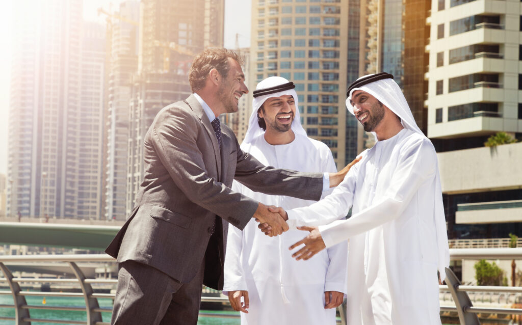 Businessmen struck a deal in Dubai.