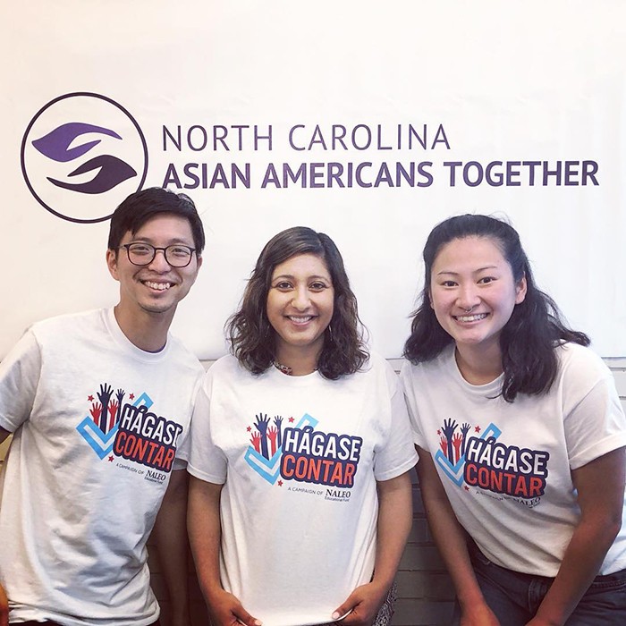 Ricky Leung, left, and Chavi Khanna Koneru, center, and another NCAAT volunteer work on census outreach in April 2019.