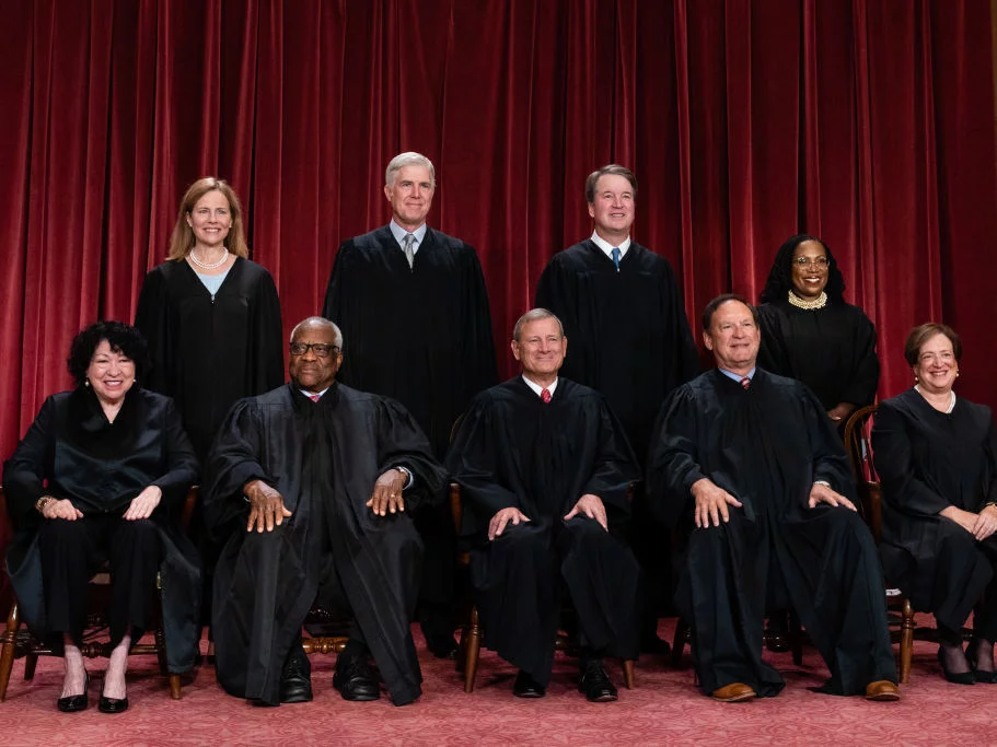 Supreme Court justices sitting in a group