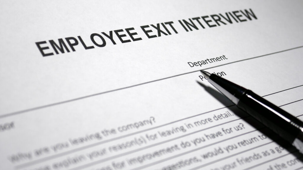 Someone filling out Employee Exit Interview.