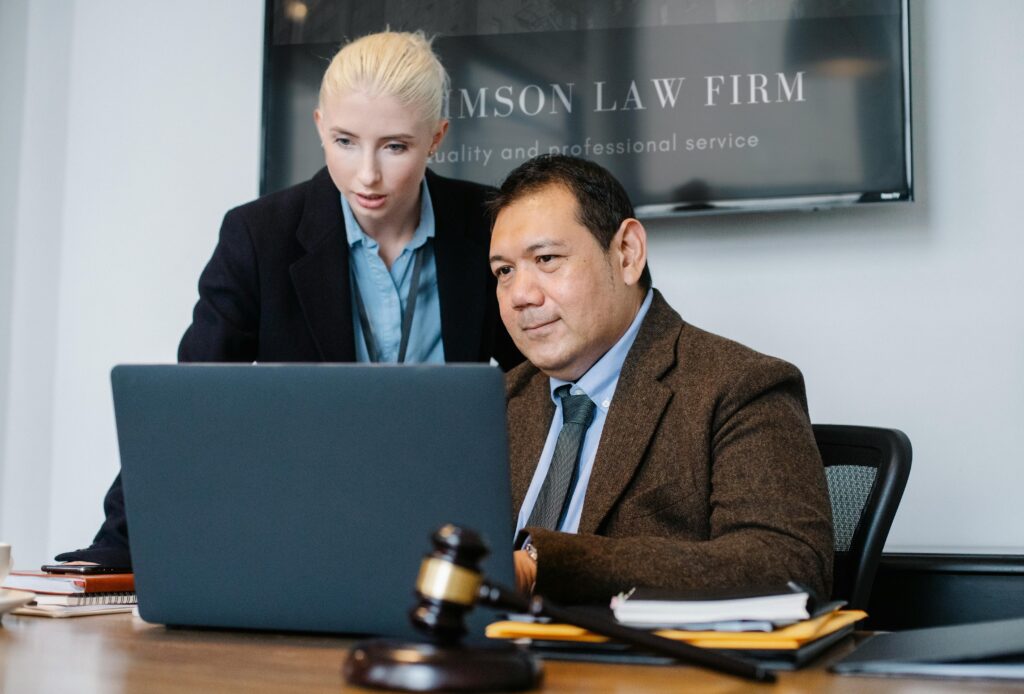 2 attorneys collaborating at a desk
