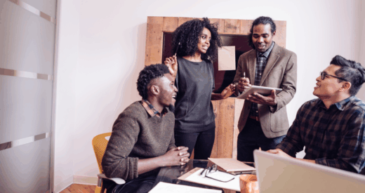 Employees discussing an employee engagement assessment/employee engagement quiz